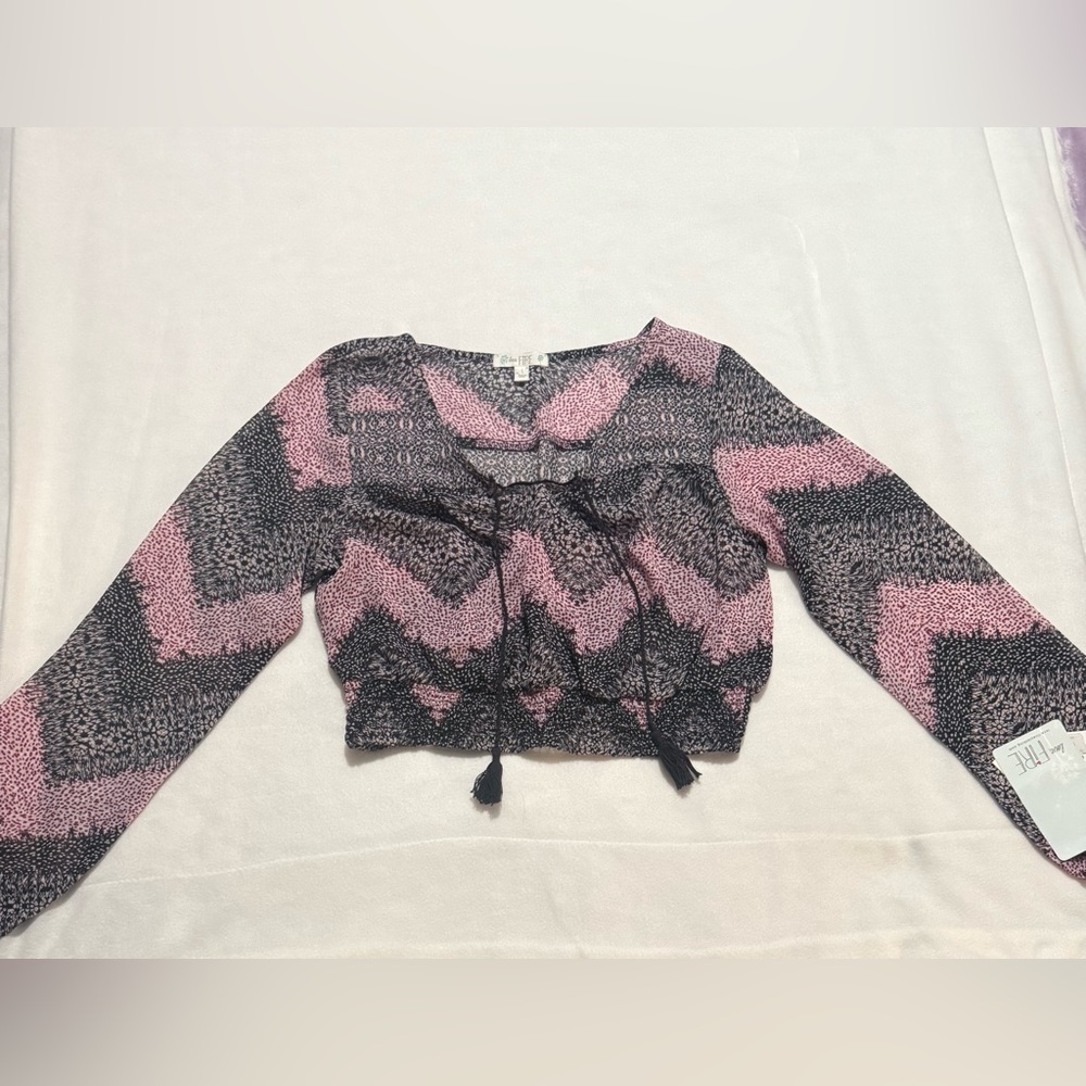 Pink chevron long sleeve crop top with tassel